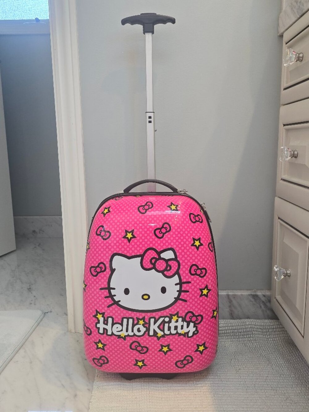 Sanrio Pink Hello Kitty Hard Shell Rolling 17" Luggage